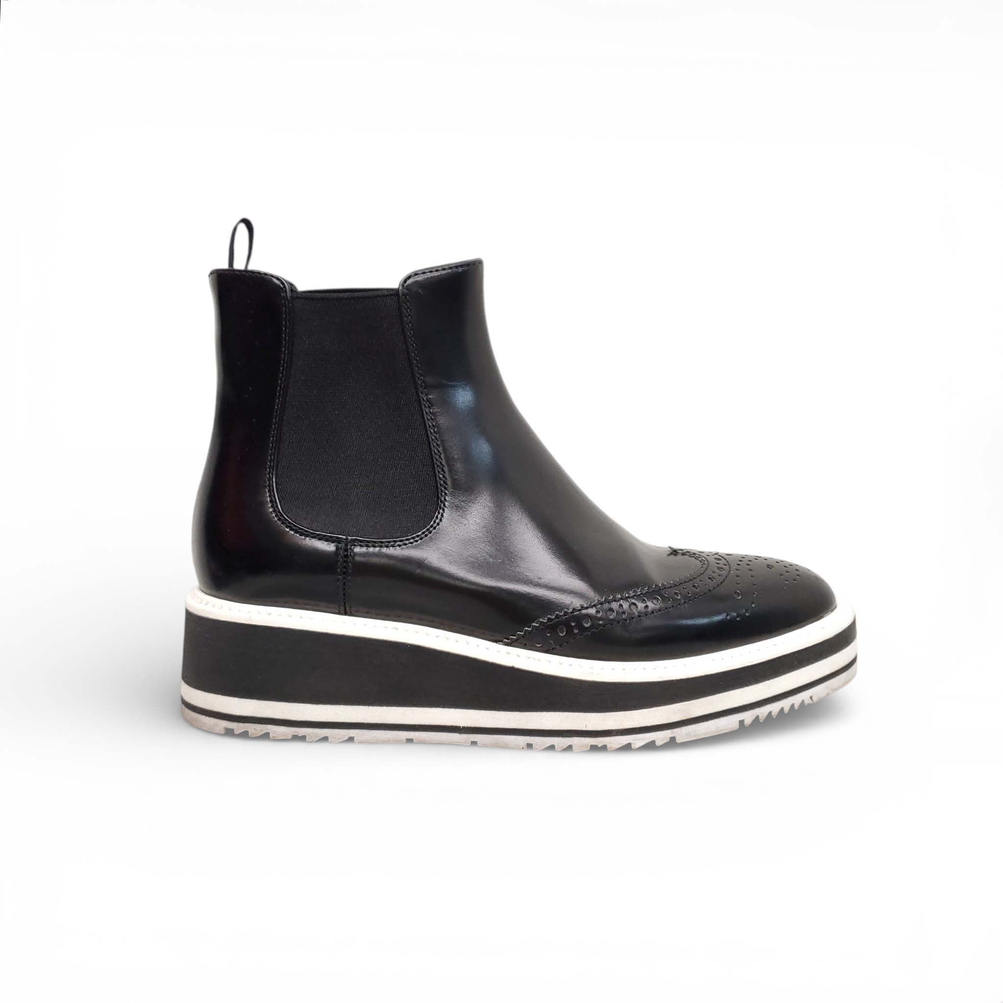 PRADA BLACK AND WHITE SPECTATOR CHELSEA BOOTS - SIZE 35.5