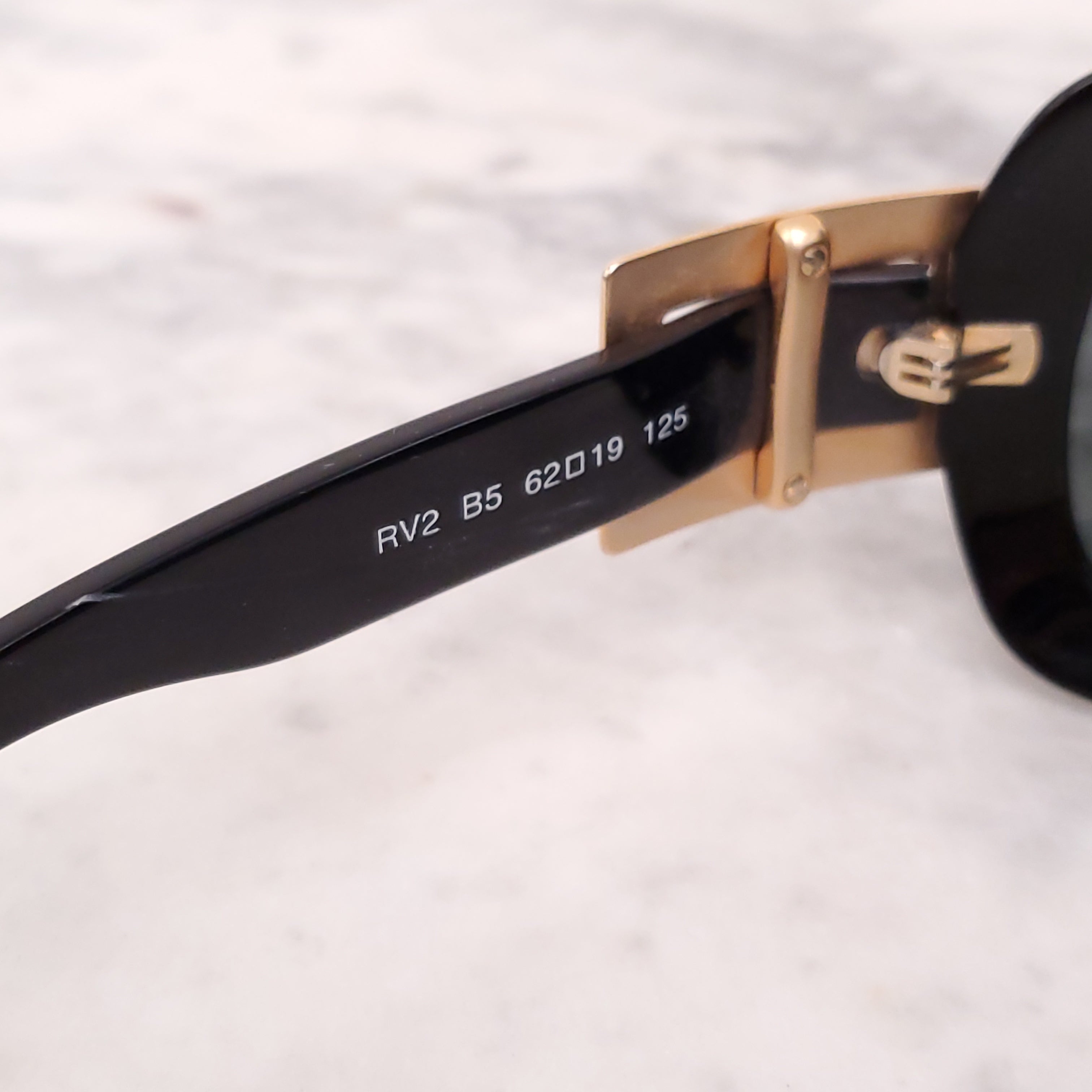 ROGER VIVIER BLACK SUNGLASSES WITH GOLD BUCKLE DETAIL