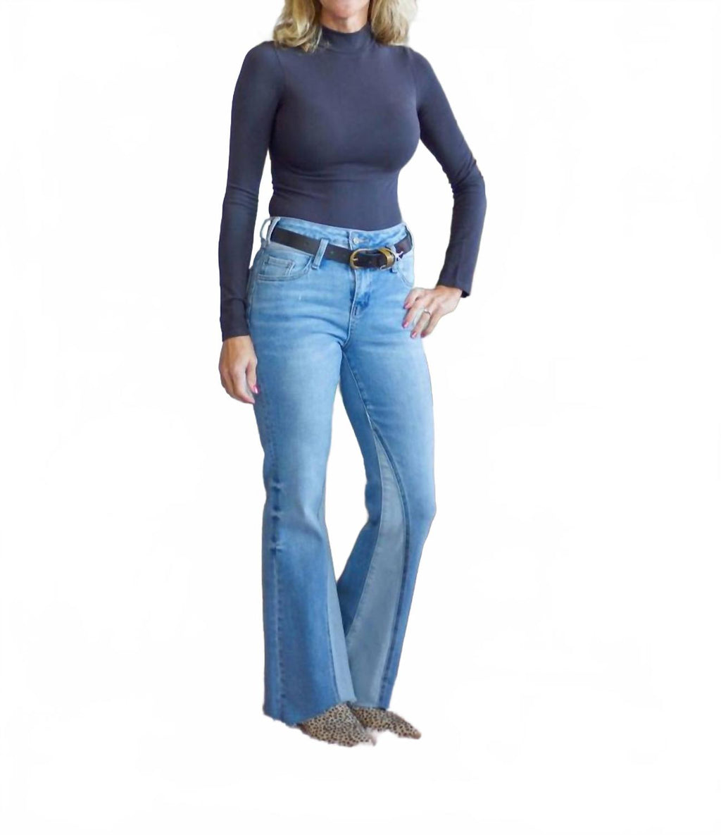 High Rise Flare With Raw Hem Jean In Light Wash
