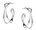 Daring Crossed Post Back Hoop Earrings In Silver