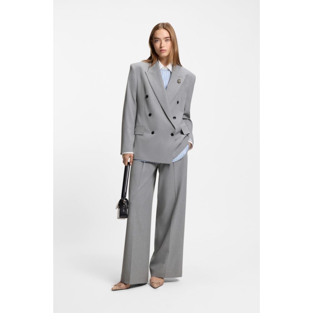 Relaxed-fit blazer with enamel flower brooch