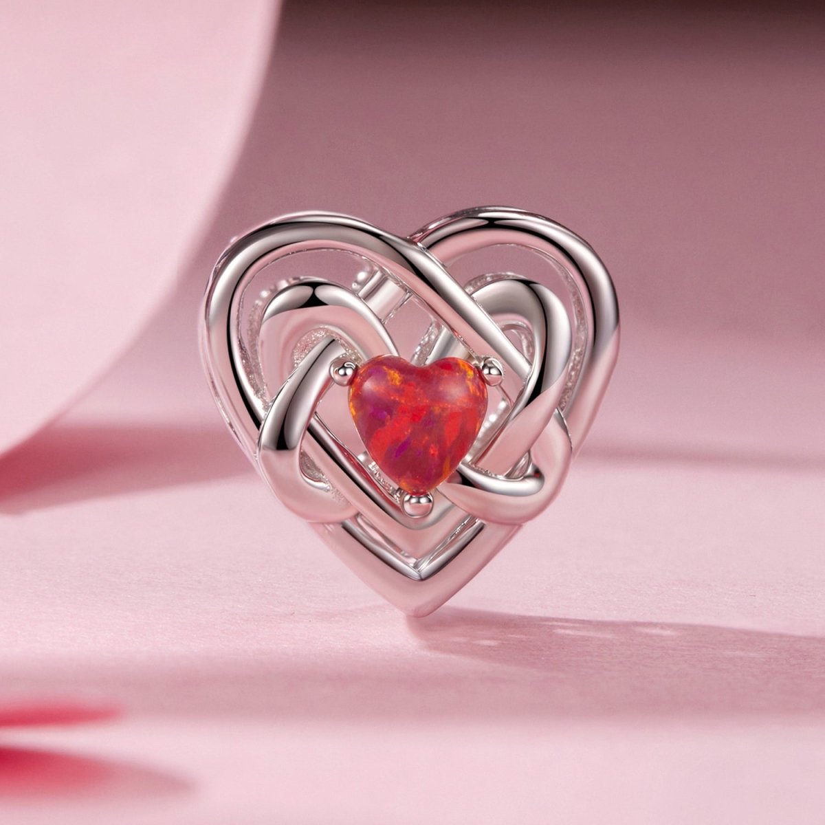 Fiery Opal Love Knot Charm