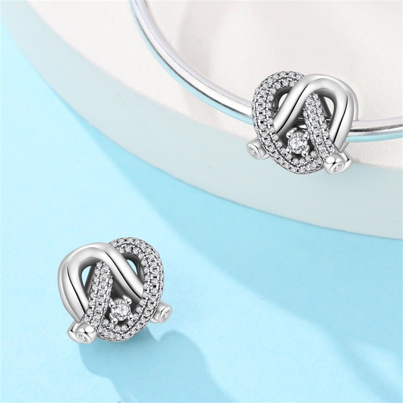 Radiant Love Knot Charm