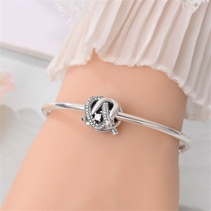Radiant Love Knot Charm